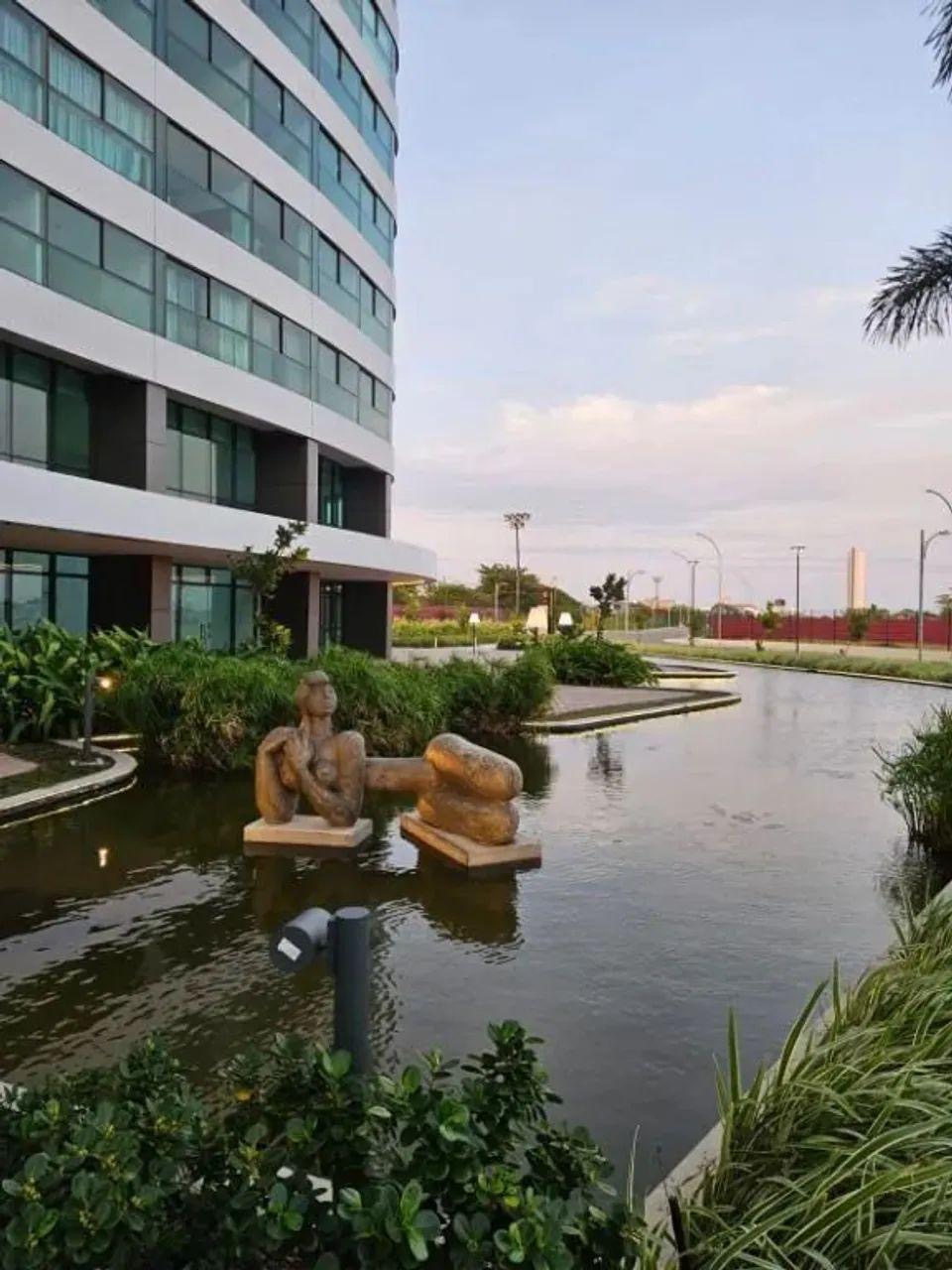 Fachada e espelho d'água — Apartamento no Parque do Cais - 3º andar
